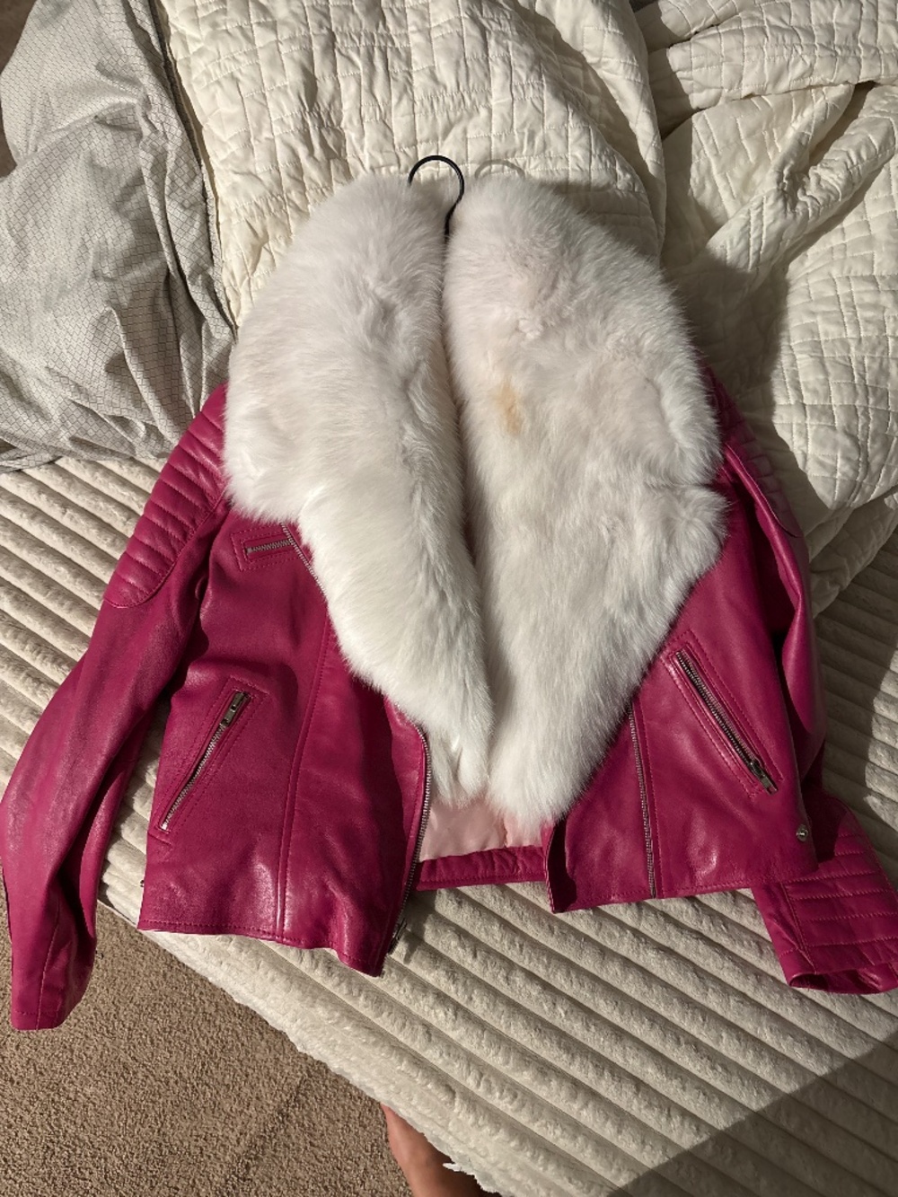 Leather jacket insulated with real white fur